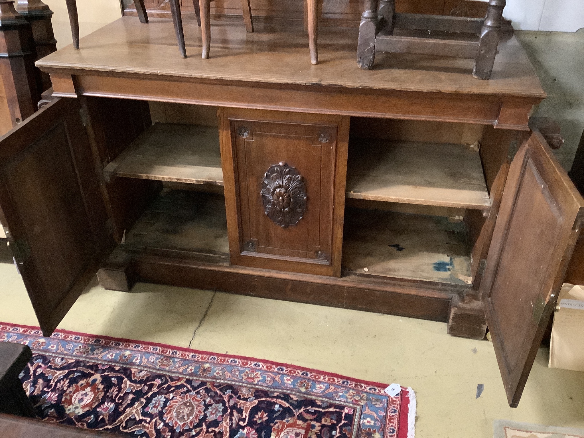 A Victorian oak side cabinet, length 150cm, depth 62cm, height 130cm